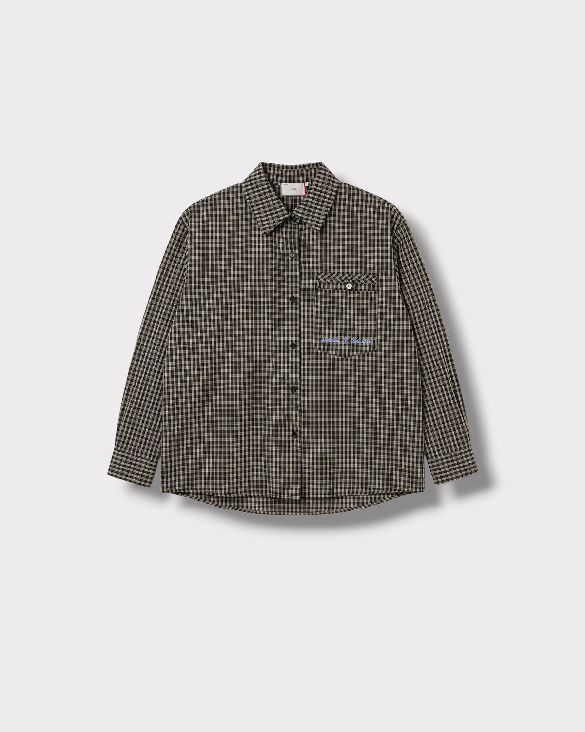 Chemise Léna à carreaux noirs et écrus, vue de face